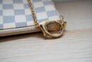 Pochette Eva Louis Vuitton