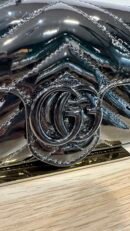 Borsa mini Gucci GG Marmont in pelle vernis nero