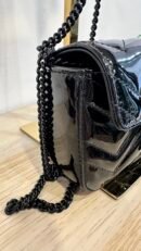 Borsa mini Gucci GG Marmont in pelle vernis nero
