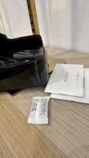 Borsa mini Gucci GG Marmont in pelle vernis nero